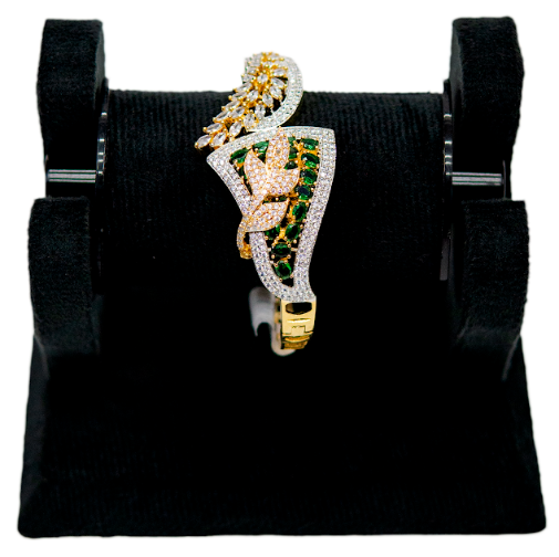 Gold Bracelet with Green Stones and Leaf Design